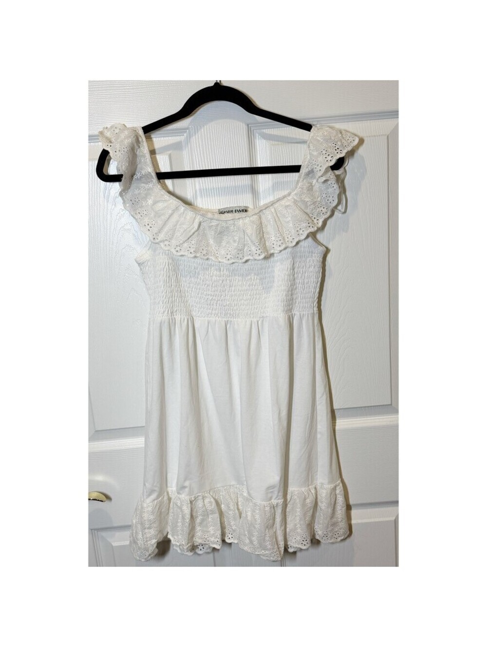 White off-shoulder ruffle dress